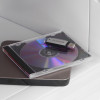 Contents of the phoenix titan 1281 safe including a USB memory stick, a CD in a case, and a thin laptop or tablet device