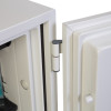 Close-up of the hinge on the open door of the phoenix titan 1281 safe showing part of the interior and exterior panels