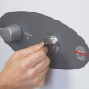Hand inserting key into the lock of a phoenix titan 1281 safe