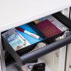 Open internal drawer of phoenix titan 1282 safe showing organised contents including cash, pen, passports and watches