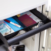 phoenix titan 1283 key lock with internal drawer open showing divided compartments containing passport, watches, money and pen