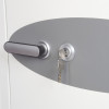 Close up of the phoenix fire commander 1911 key lock inserted in a grey door lock with key hanging down