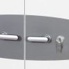 Close up front view of the phoenix fire commander 1913 key lock with key inserted on grey and white surface