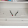 phoenix fire commander pro fs1922 electronic lock floor fixing kit showing two metal fixing bolts on a white surface
