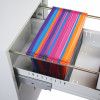 angled view of phoenix world class vertical fire file key lock showing colourful hanging file folders inside a metal drawer