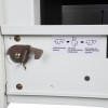 Close up of the locking mechanism on the phoenix world class vertical fire file key lock with instructions label