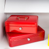 phoenix hs1091 diamond deposit security safe electronic lock shown with two red cash boxes stacked inside a white shelf