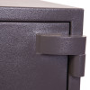 close up of the hinge on the phoenix mercury hs2051 security safe showing textured dark metal surface
