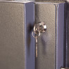 phoenix mecury hs2052 security safe close up of internal key lock with key inserted