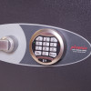 Close up of the electronic lock on the phoenix elara hs3552 security safe showing keypad and handle