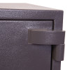 Close up of the hinge on the phoenix elara hs3552 security safe showing textured dark metal surface