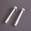 phoenix elara hs3554 security safe bolt down screws shown side by side on a grey surface