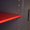 Internal shelf inside the phoenix elara hs3554 security safe in dark grey with a red shelf panel