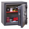 Open door of phoenix planet hs6071 security safe showing items inside including watch passport and camera