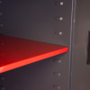 Red internal shelf inside the phoenix planet hs6073 security safe showing adjustable shelf positions