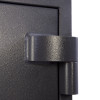 Close-up of a hinge on the phoenix cosmos hs9071 security safe showing the textured dark metal surface
