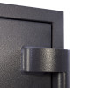 Close-up of the hinge on the phoenix cosmos hs9071 security safe showing textured metal surface