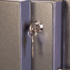 phoenix cosmos hs9072 security safe showing an internal key lock with key inserted