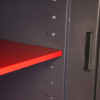 Internal shelf detail of the phoenix cosmos hs9072 security safe showing grey interior and red shelf panel