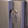 phoenix cosmos hs9073 security safe showing internal key lock with key inserted partway