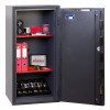 phoenix cosmos hs9074 security safe fully open with shelves holding binders, a laptop, and various items inside