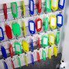 Inside view of the phoenix electronic key safe showing multiple coloured key tags hanging on numbered hooks
