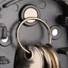 Close-up of a magnet holding a keyring with keys on the phoenix key store product