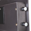 Close up of locking bolts on the phoenix vela security safe electronic lock showing two metal bolts extending from the door edge