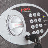 Close up of the front of the phoenix vela security safe electronic lock showing the keypad and key slot