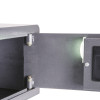 phoenix vela security safe electronic lock with door open showing the internal light illuminating the safe interior