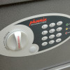 Front angled down view of the phoenix vela security electronic lock showing keypad and dial