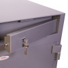 phoenix cash deposit security electronic lock showing lockable deposit slot with key inserted