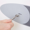 Hand inserting key into lock of phoenix fortress 1183 security safe key lock showing key in use