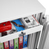 Internal drawer of phoenix firefox fireproof safe key lock showing contents including watch and camera