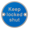 Front of a round keep locked shut metal sign with blue background and white text and two mounting holes