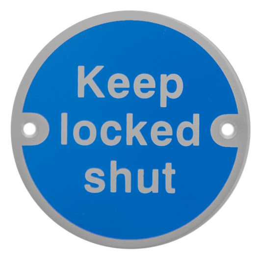 Front of a round keep locked shut metal sign with blue background and white text and two mounting holes