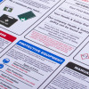 health safety at work guide poster showing sections on first aid, protective equipment, and company safety policy at an angle