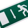 Close up of fire exit sign eec directive down with white arrow and running figure on green rigid plastic background