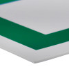 Close-up of the edge of a fire exit sign eec directive down right rigid plastic showing the layered material and green arrow portion