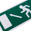 Close up of a fire exit sign eec directive up left rigid plastic showing a running figure and arrow pointing up left