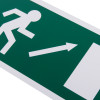 Close up of fire exit sign eec directive upright rigid plastic showing white running figure and arrow on green background