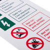 Close up of a white rigid plastic co2 extinguisher id sign showing safety and hazard information with symbols and text