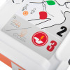 AED instruction panel with CPR illustration, pad placement graphics, and step numbers for defibrillation sequence.