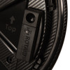 Closeup of the alarm on a rotaid solid plus defibrillator cabinet showing the black alarm device and carbon fibre texture background