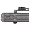 Close-up view of the back of a silver rutland overhead door closer showing the label and arm mechanism