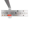Internal view of the Rutland TS9205DABC overhead door closer, showing the silver closer body, adjustment valves, installation diagrams, certification markings, and attached arm assembly.