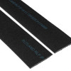 Close-up of two black Rutrplpik30 Rutland Letterplate Intumescent Strips 30 Minute Angled showing blue printed text