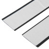 Close-up image showing two Rutrplpik30 Rutland Letterplate Intumescent Strips with white backing and black edges