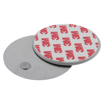 magnetic alarm mounting kit showing two separated circular metal pieces, one with adhesive backing and the other plain metal