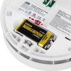 easichange heat alarm brk replacement showing close up of battery compartment with battery installed